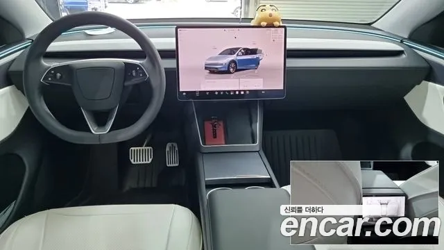 Tesla Model Y — Фото автомобиля 11