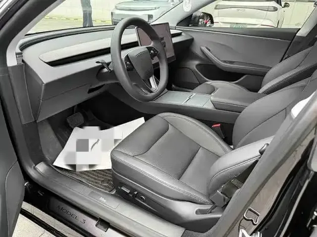 Tesla Model 3 — Фото автомобиля 5