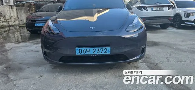 Tesla Model Y — Фото автомобиля 3