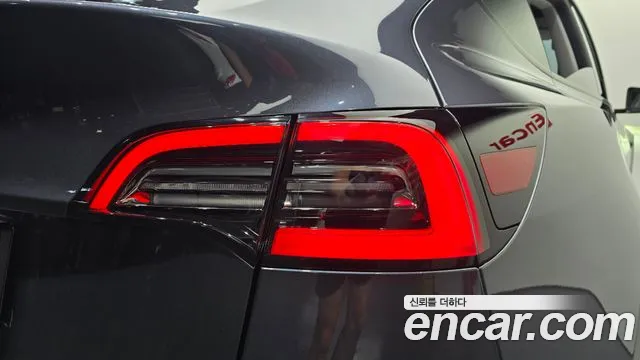 Tesla Model Y — Фото автомобиля 7