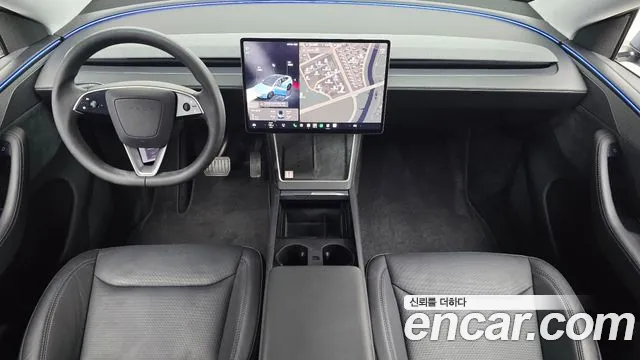 Tesla Model Y — Фото автомобиля 6
