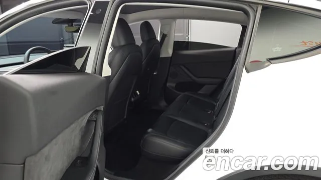 Tesla Model Y — Фото автомобиля 17