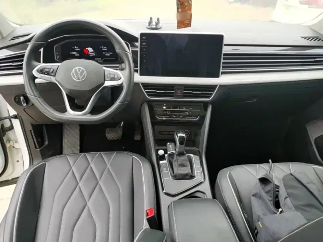 Volkswagen Tiguan L — Фото автомобиля 9