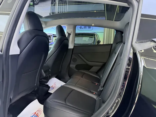 Tesla Model Y — Фото автомобиля 7
