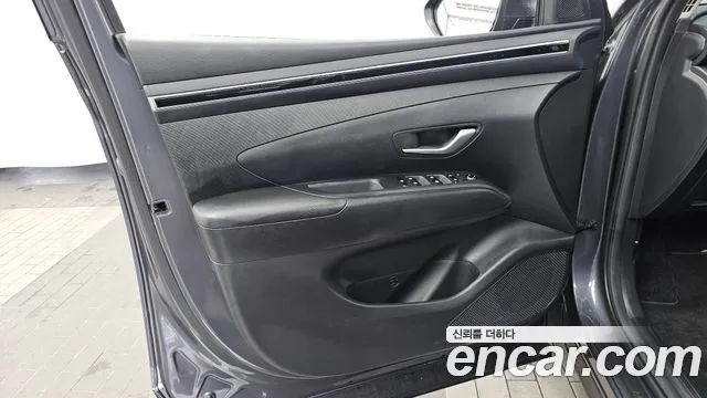 Hyundai Tucson Tucson (NX4) Бензин 1.6 Turbo 4WD — Фото автомобиля 24