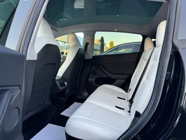 Tesla Model Y — Фото автомобиля 23