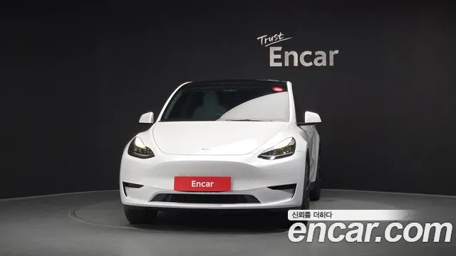 Tesla Model Y — Фото автомобиля 3