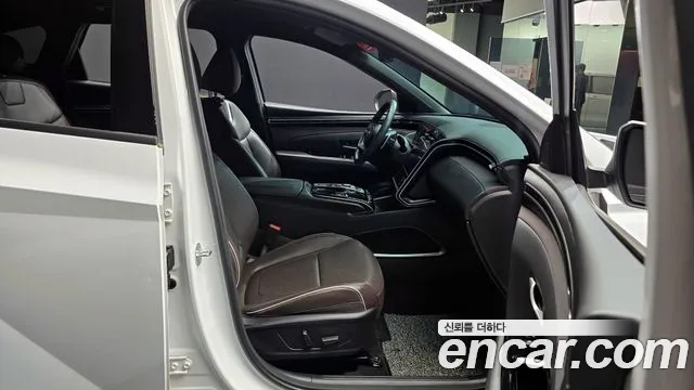 Hyundai Tucson Tucson (NX4) Бензин 1.6 турбо 2WD — Фото автомобиля 11