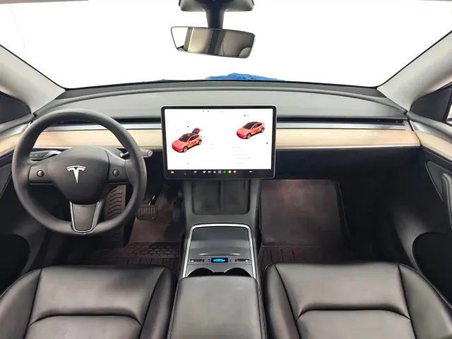 Tesla Model Y — Фото автомобиля 11