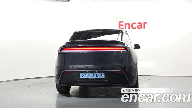 Tesla Model Y — Фото автомобиля 4