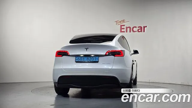 Tesla Model Y — Фото автомобиля 4