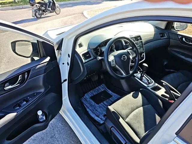 Nissan Tiida — Фото автомобиля 15
