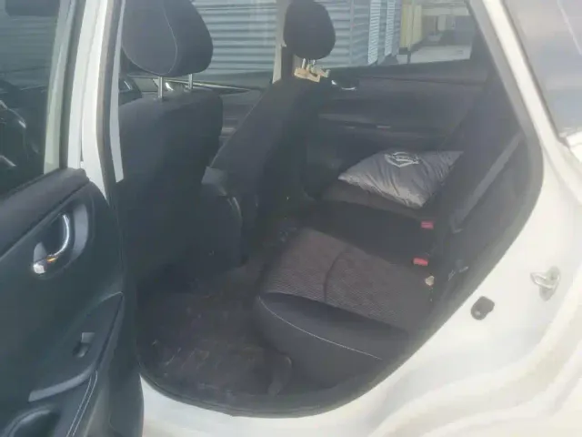 Nissan Tiida — Фото автомобиля 16