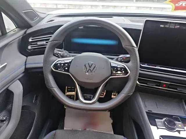Volkswagen Tiguan L — Фото автомобиля 10