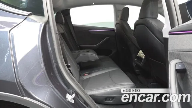Tesla Model Y — Фото автомобиля 10