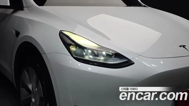 Tesla Model Y — Фото автомобиля 22