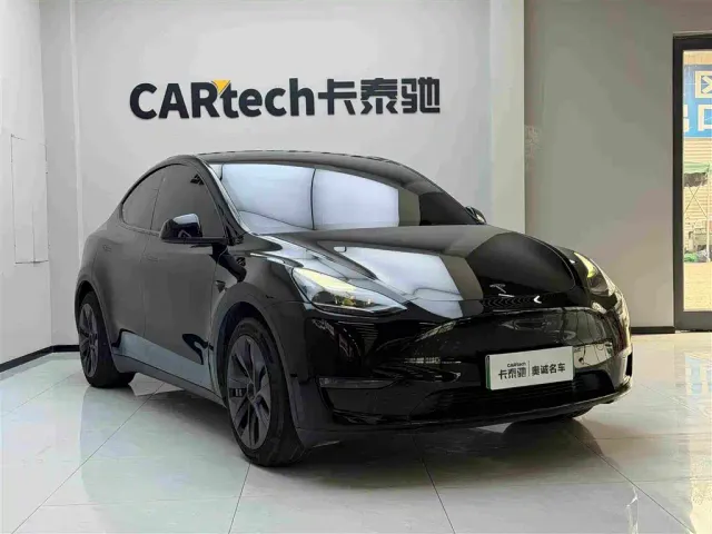 Tesla Model Y — Фото автомобиля 3