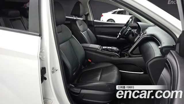 Hyundai Tucson Tucson (NX4) Бензин 1.6 турбо 2WD — Фото автомобиля 11