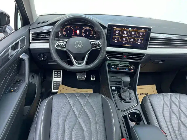 Volkswagen Tiguan L — Фото автомобиля 27