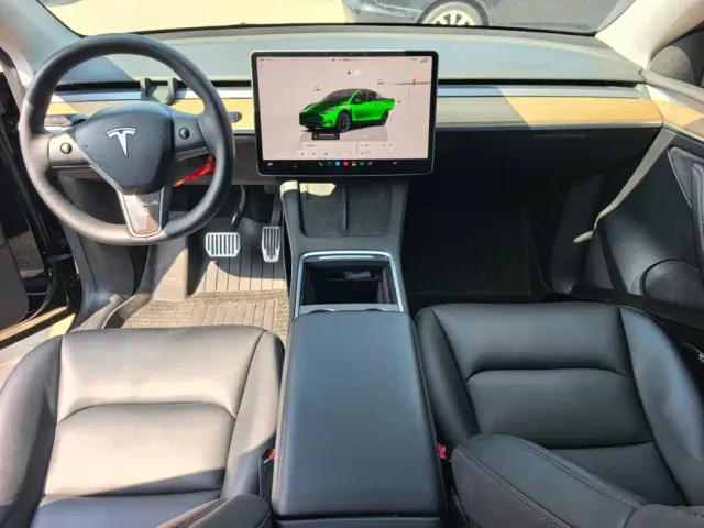 Tesla Model Y — Фото автомобиля 10