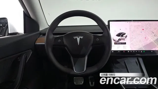 Tesla Model Y — Фото автомобиля 18