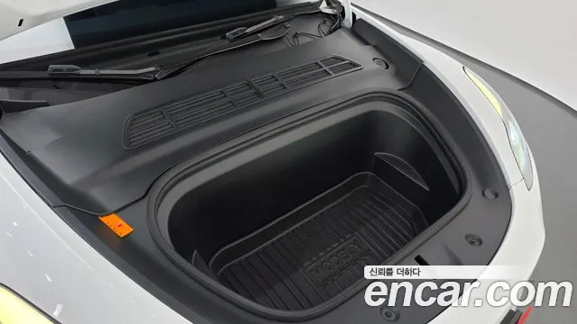 Tesla Model Y — Фото автомобиля 6