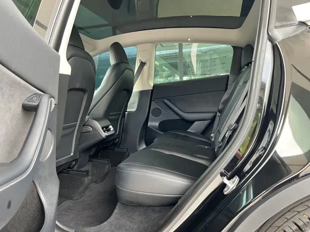 Tesla Model Y — Фото автомобиля 7