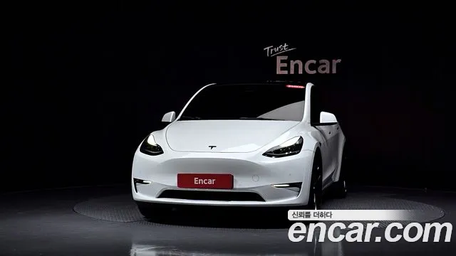 Tesla Model Y — Фото автомобиля 2