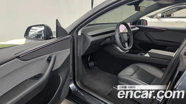 Tesla Model Y — Фото автомобиля 15