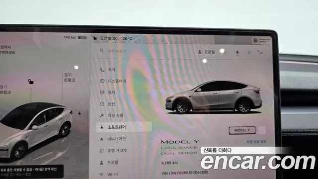 Tesla Model Y — Фото автомобиля 11