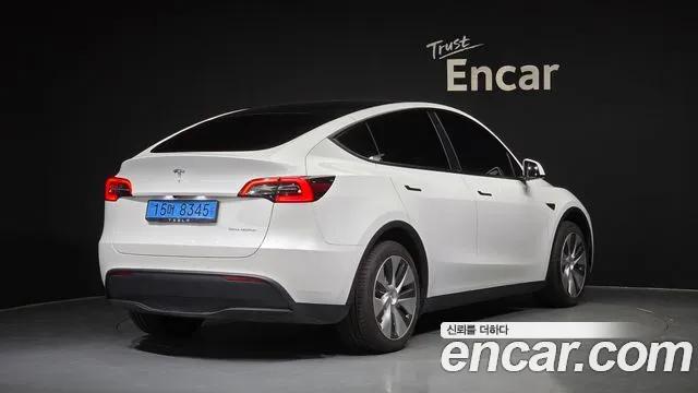 Tesla Model Y — Фото автомобиля 2