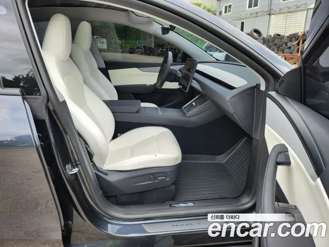 Tesla Model Y — Фото автомобиля 7