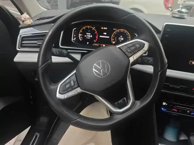 Volkswagen Tiguan L — Фото автомобиля 15