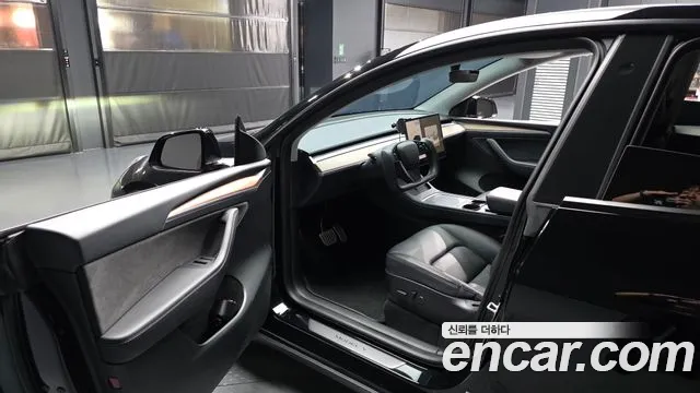 Tesla Model Y — Фото автомобиля 2