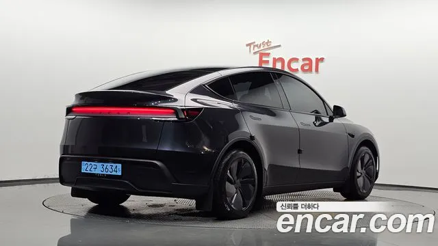 Tesla Model Y — Фото автомобиля 2