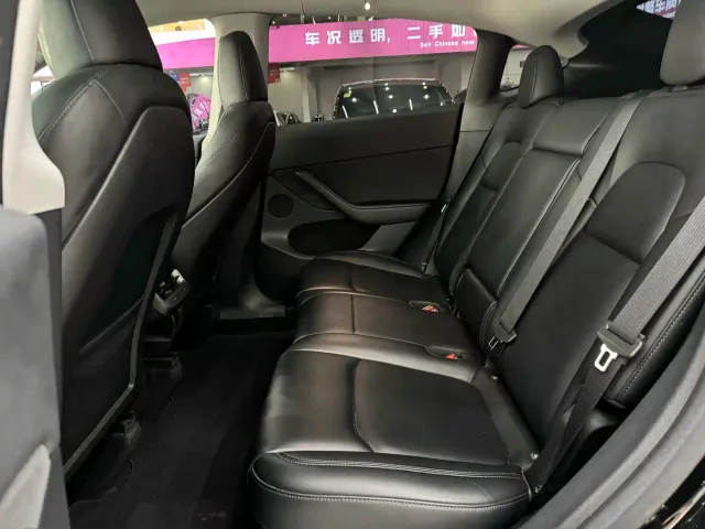 Tesla Model Y — Фото автомобиля 12