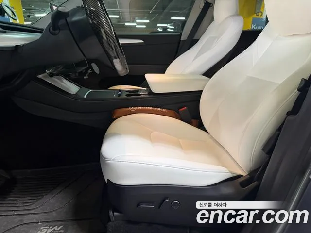 Tesla Model Y — Фото автомобиля 11