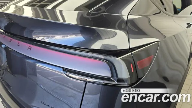 Tesla Model Y — Фото автомобиля 8