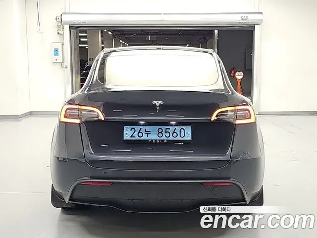 Tesla Model Y — Фото автомобиля 4