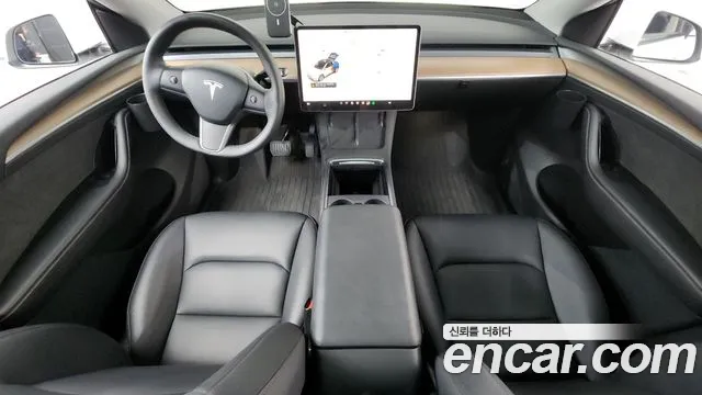 Tesla Model Y — Фото автомобиля 10