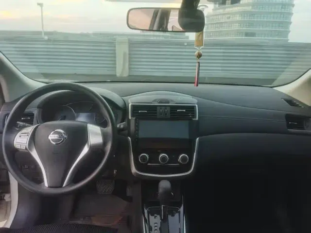 Nissan Tiida — Фото автомобиля 8