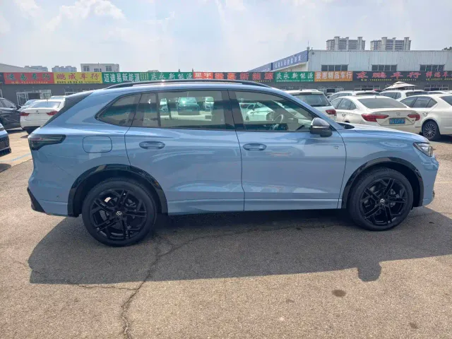 Volkswagen Tiguan L — Фото автомобиля 5