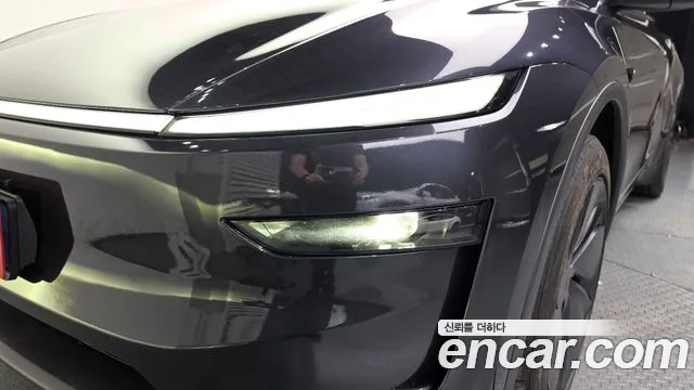 Tesla Model Y — Фото автомобиля 7