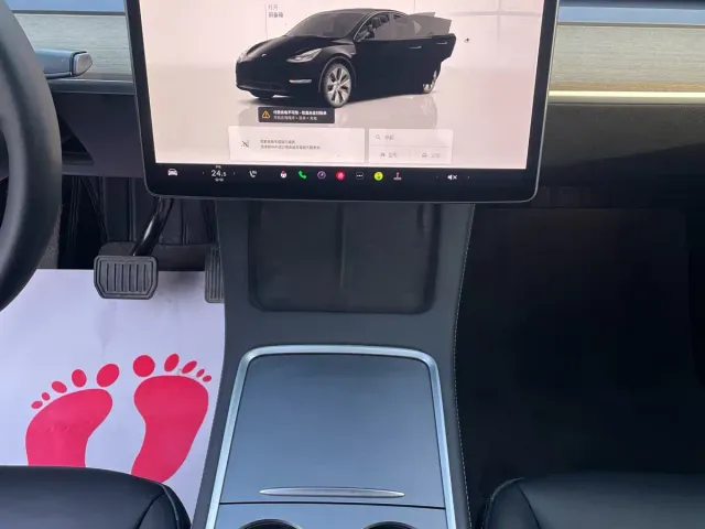 Tesla Model Y — Фото автомобиля 11