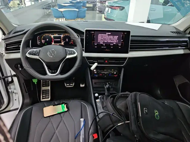 Volkswagen Tiguan L — Фото автомобиля 9