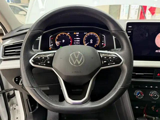 Volkswagen Tiguan L — Фото автомобиля 11