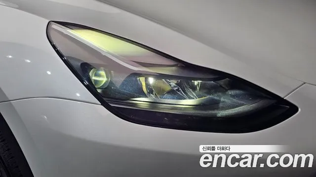 Tesla Model Y — Фото автомобиля 7