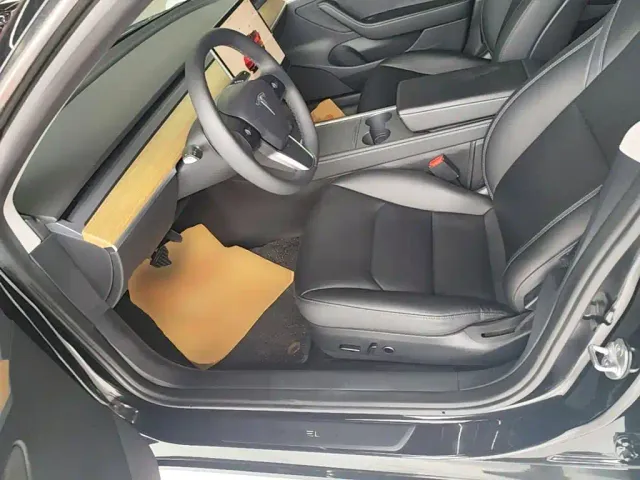 Tesla Model 3 — Фото автомобиля 14