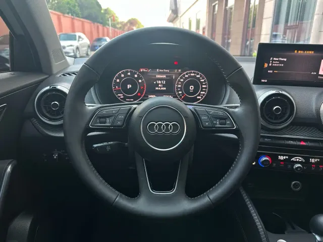 Audi Q2L — Фото автомобиля 9