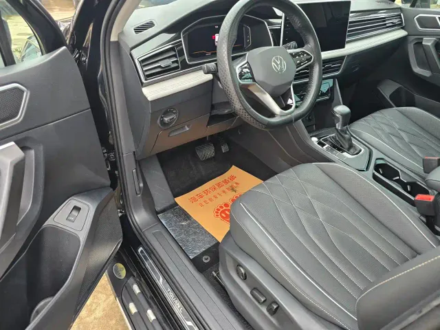 Volkswagen Tiguan L — Фото автомобиля 10